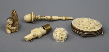 A Victorian ivory whistle modelled as the head of a hound and four other items, including a carved