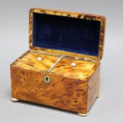 A tortoiseshell tea caddy