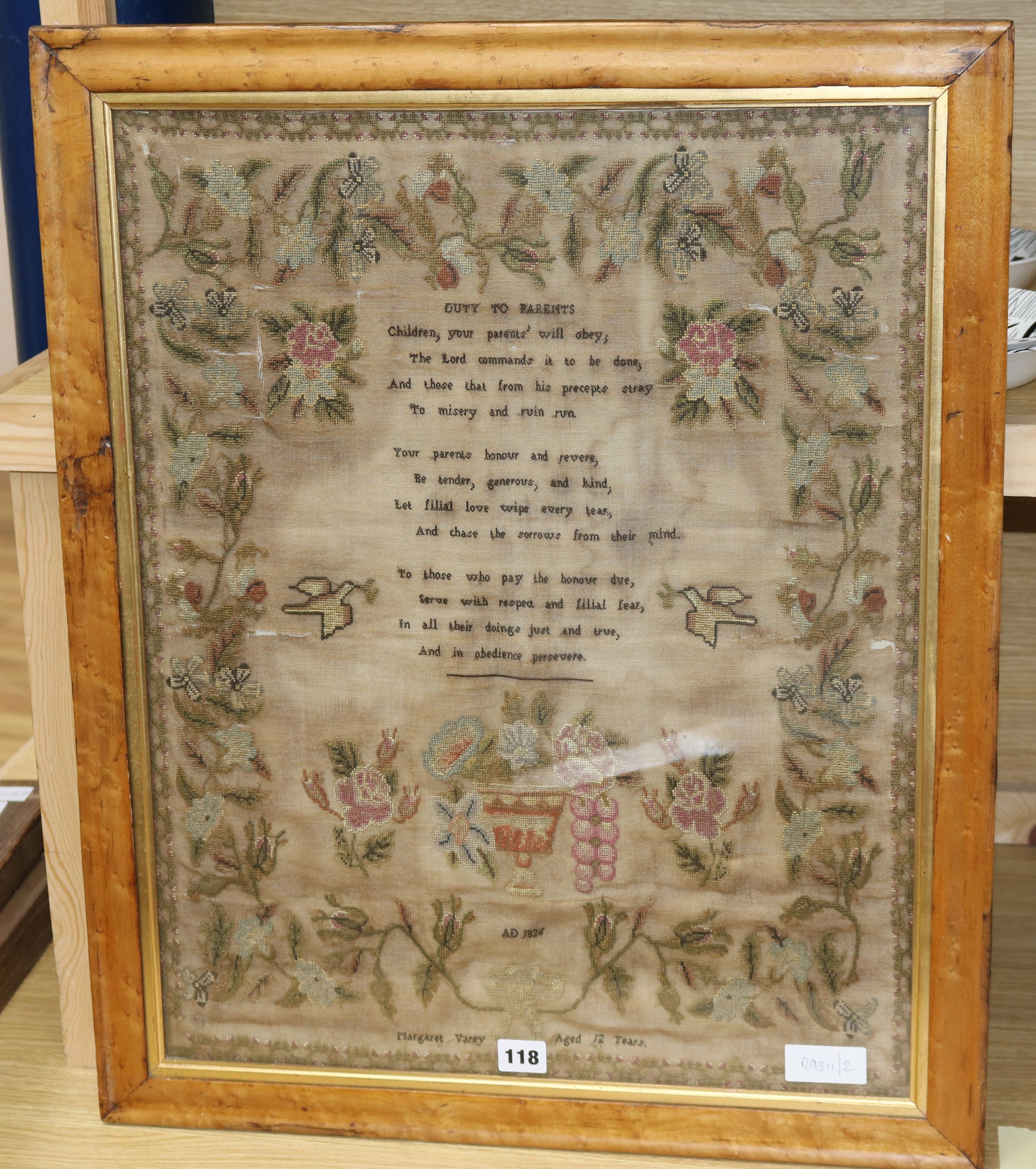 A George IV needlework sampler dated 1826, maple framed 61.5 x 48cm excl. frame