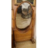 A 19th century French bird's eye maple cheval mirror W.90cm