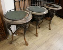 Three Victorian circular topped pub tables with cast iron bases W.61cm