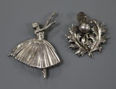 A 1930's Scottish silver and gem set thistle brooch and a 1940's silver ballerina brooch, largest