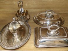 A quantity of plated wares including two tureens, two oval dishes, a cream jug and egg cruet