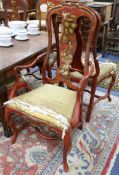 A set of twelve lacquer chairs