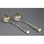 A pair of early Victorian Scottish provincial silver fiddle pattern sauce ladles by Joseph Pozzi &