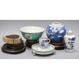 A group of Chinese porcelain and wood stands (10)