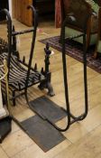 A pair of wrought iron log stacking brackets W.60cm approx.