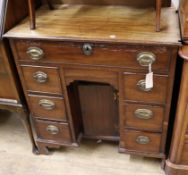 A George III mahogany kneehole desk W.77cm