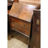 A 1930's walnut bureau W.54cm