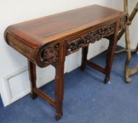 A Chinese carved hardwood 'altar' table W.117cm