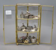 A collection of Woodsetton decorative pewter boxes, miniature animals etc, contained in a small