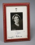 A presentation portrait photograph of Princess Alice, in gilt-tooled red leather frame, inscribed '