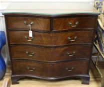 A George III style mahogany serpentine five-drawer chest W.99cm