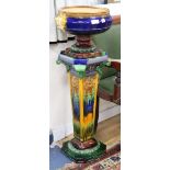 A Majolica style jardiniere on stand overall height 108cm