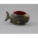 An Edwardian silver pin cushion in the form of a fish, Chester 1908, makers Sampson Mordan & Co Ltd,