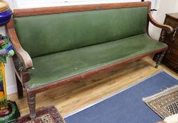 A Victorian beech hall bench upholstered in hide W.210cm