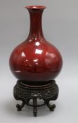 A Chinese Langyao bottle vase, Kangxi period, restored, wood stand height 29cm excl. stand