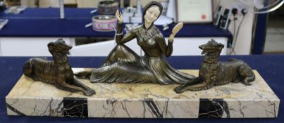 A spelter and marble Art Deco style figure signed "Mollins" on stand