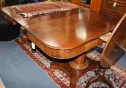An early Victorian pine mahogany D end dining table
