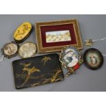 A 19th century hairwork memorial brooch in scrolled frame and sundry items, including a Japanese