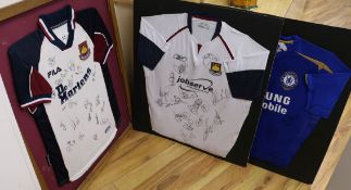 Two West Ham player signed shirts from 2000's and a similar Chelsea shirt (all mounted)