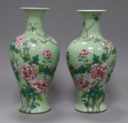 A pair of Chinese famille rose celadon ground vases height 25cm