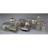 Thirteen assorted silver topped toilet jars etc. including one by Asprey & Co.