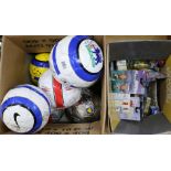 A collection of footballs signed by Premiership players and packaged Pro stars models