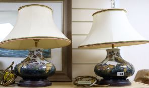 A pair of Moorcroft blackberry pattern lamps