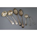 A pair of Georgian silver berry spoons, a pair of George IV silver sauce ladles, a silver sifter