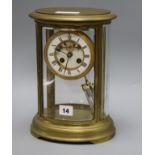 An oval four glass mantel clock height 21cm