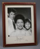 A presentation portrait photograph of Princess Margaret, David Armstrong-Jones and Lady Sarah