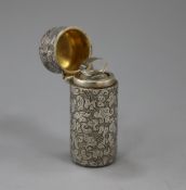 A late Victorian engraved silver cylindrical scent bottle by Sampson Mordan, London, 1886, 54mm.