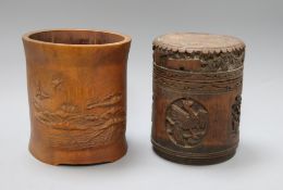 A 19th century or later Chinese carved bamboo canister and a brush pot tallest 16cm