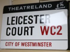 An enamel street sign for Leicester Court WC2 City of Westminster