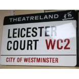 An enamel street sign for Leicester Court WC2 City of Westminster