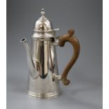 A Queen Anne style silver chocolate pot, London 1960, makers Tessiers Ltd, gross 24 oz.