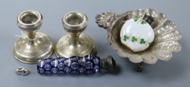 A quantity of silver including dwarf candlesticks, butter shell, two mounted scent bottles and a