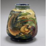 A Moorcroft vase, decorated with carp height 14cm