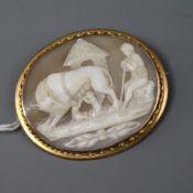 A Italian Romulus and Remus shell cameo brooch, the frame stamped 9ct.
