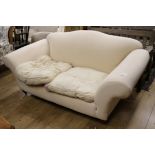 A white upholstered settee W.180cm