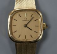 A lady's 9ct gold Omega wristwatch on mesh bracelet.