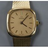 A lady's 9ct gold Omega wristwatch on mesh bracelet.