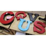 Five metal and composition signage letters - G (x2), U, S and V