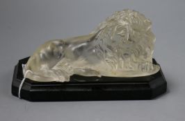 A French opalescent glass lion on a black plinth base height 9cm