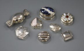 Eight assorted modern pill boxes including three inset with hardstone of mother of pearl.