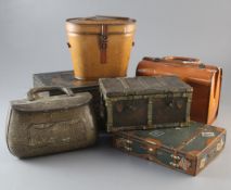 Seven Huntley & Palmer biscuit tins in the form of suitcases, trunks, a crocodile handbag and a