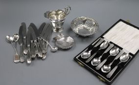 A silver cream jug, a silver bowl and mixed cutlery etc including silver spoons.