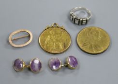 A pair of yellow metal and amethyst cufflinks, an oval brooch, a silver and paste ring and two