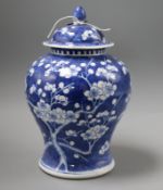 A Chinese prunus pattern jar and cover